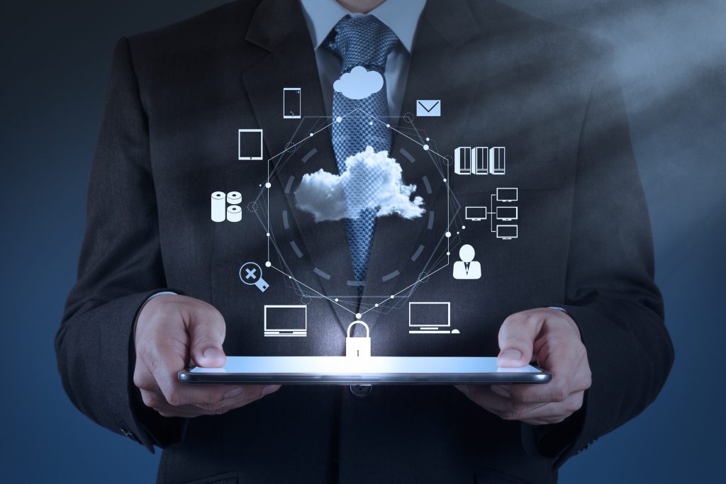 Businessman,Hand,Working,With,A,Cloud,Computing,Diagram,On,The Businessman,Hand,Working,With,A,Cloud,Computing,Diagram,On,The
